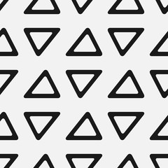 Seamless pattern with triangles. Simple geometric print.