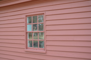 Obraz na płótnie Canvas red wall on building or home with glass window