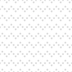 Seamless pattern with pastel gray hand drawn stars on white background. Sky background. Cute wrapping paper. Vector illustration.