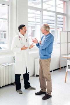 Doctor and patient talking in medical practice