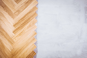 Natural parquet seamless floor texture. Herringbone copyspace.