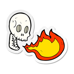 sticker of a cartoon fire breathing skull