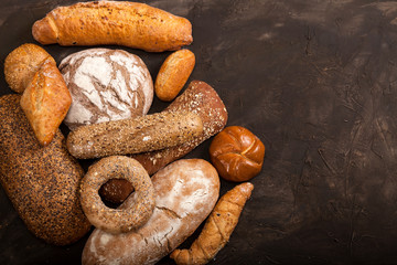 Assortment of baked goods on dark background