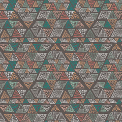 Hand drawn colorful triangle seamless pattern with green, pink, blue, orange details. Doodle triangles on brown. Triangular geometrical background. Repeating geometric tiles. Vector illustration.