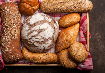 Assortment of baked goods on dark background