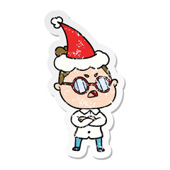 distressed sticker cartoon of a annoyed woman wearing santa hat