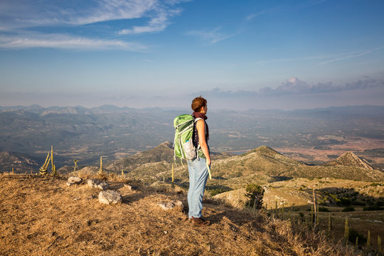Greece, Peloponnese, Arcadia, Lykaion, woman enjoying the view from mountain Profitis Ilias