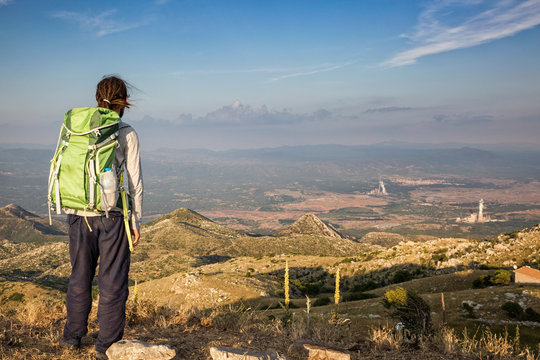 Greece, Peloponnese, Arcadia, Lykaion, man enjoying the view from mountain Profitis Ilias