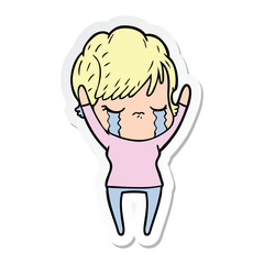 sticker of a cartoon woman crying