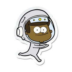 sticker of a happy astronaut cartoon