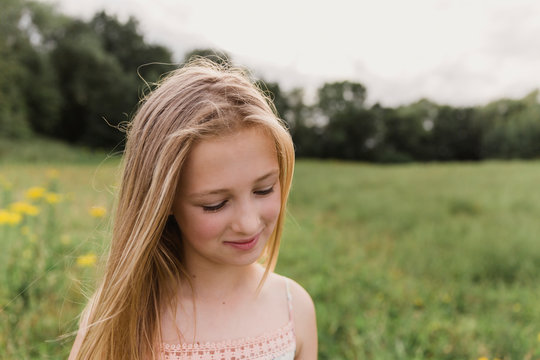 Portrait of blond girl in nature
