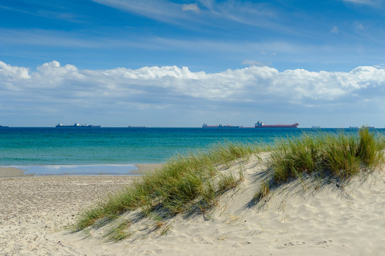 Denmark, Jutland, Skagen, Grenen, beach and ships on the sea