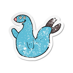 retro distressed sticker of a cartoon happy seal