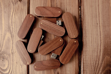wooden usb flash drive on wooden desk