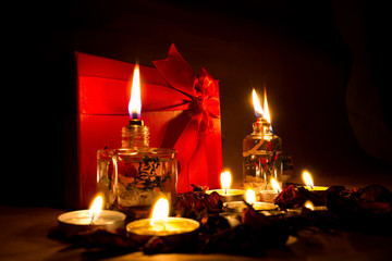 Beautiful candles and gifts burning on Valentine's Day