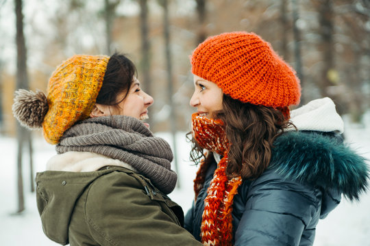 Two best friends face to face in the snow