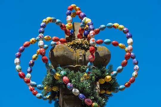 Osterkrone, crown from colorful Easter eggs, Osterbrunnen, Langenburg, Baden-Wurttemberg, Germany, Europe