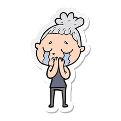 sticker of a cartoon crying woman