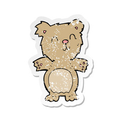 retro distressed sticker of a cartoon cute teddy bear