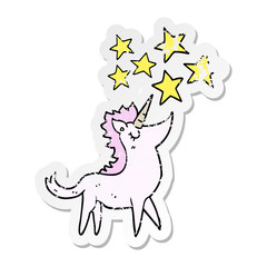 distressed sticker of a cartoon unicorn