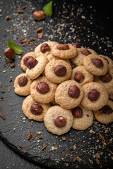 Typical french cookies with hazelnuts. Fresh, crispy and airy dessert. Confectionery assortment. 
