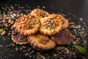 Typical french cookies with sunflower seeds. Fresh, crispy and airy dessert. Confectionery assortment. 