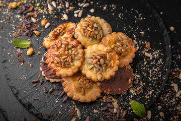 Typical french cookies with sunflower seeds. Fresh, crispy and airy dessert. Confectionery assortment. 