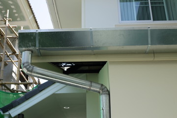 stainless steel of roof gutter on residential house building