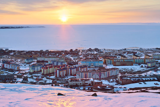 Pevek is the northernmost city in Russia. In May, during a polar day in the Arctic, the sun does not disappear over the horizon at night. The Arctic Ocean is covered in ice. Chukotka, Russian Far East