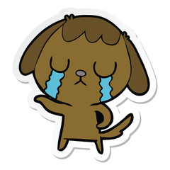sticker of a cute cartoon dog crying