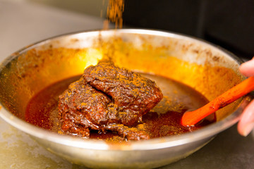 Saucing Nashville Style Hot Chicken