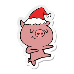 happy sticker cartoon of a pig dancing wearing santa hat