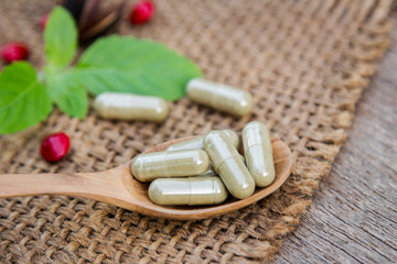 Fototapeta na wymiar Herbal medicine in capsules for healthy eating 
