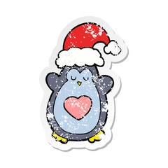 distressed sticker of a cute christmas penguin