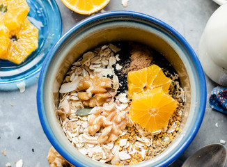 Orange breakfast bowl preparation