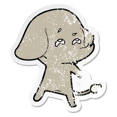 distressed sticker of a cartoon elephant remembering