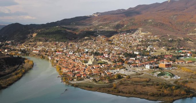 Mtskheta, Georgia. Top View Of Ancient Town Located At Valley Of Confluence Of Rivers Mtkvari Kura And Aragvi In Picturesque Highlands. Autumn Season