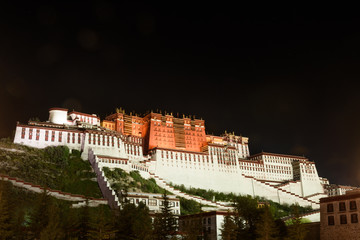 Night scene of the Potala Palace from the Potala Palace Square  in the front,  Lhasa, Tibet, China....