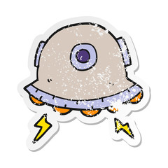 distressed sticker of a cartoon UFO