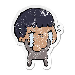 distressed sticker of a cartoon man crying