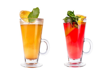 Various colorful refreshing fruit cocktails in glass mugs on white background.