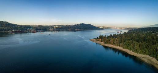 Aerial Panoramic view of a beautiful Ocean Inlet in the Modern City during a sunny summer day. Taken in Deep Cove, North Vancouver, BC, Canada.