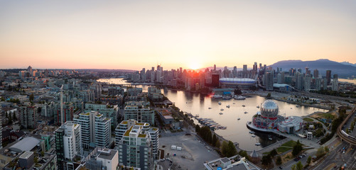 Fototapeta na wymiar Aerial Panoramic view of a modern city during a sunny summer sunset. Taken in Downtown Vancouver, British Columbia, Canada.