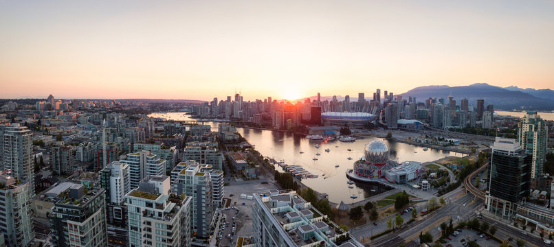 Aerial Panoramic view of a modern city during a sunny summer sunset. Taken in Downtown Vancouver, British Columbia, Canada. © edb3_16