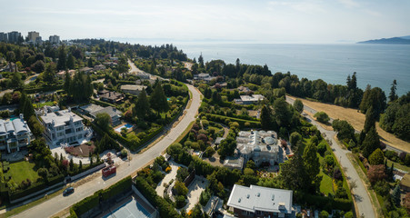 Aerial view of a modern city during a sunny summer day. Taken in Vancouver, BC, Canada.