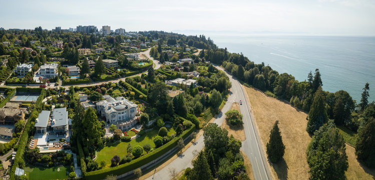 Aerial view of a modern city during a sunny summer day. Taken in Vancouver, BC, Canada.