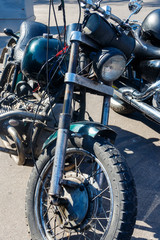 Close-up of motorcycle parked on city street