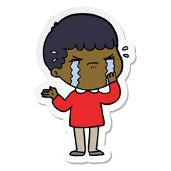 sticker of a cartoon man crying