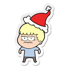 sticker cartoon of a annoyed man wearing santa hat