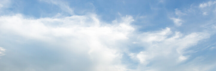 Panorama white fluffy clouds in the blue sky .blue sky background with tiny clouds
